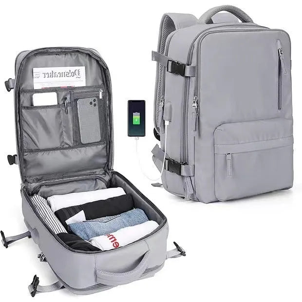 Large waterproof mummy-style backpack in nylon, shown in a selection of colours including black, mint green, and pink.