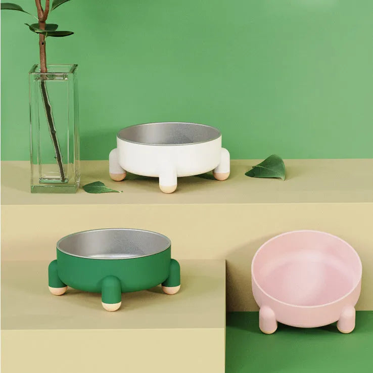 Stainless steel raised pet bowl with non-slip base in green, pink and white colour options