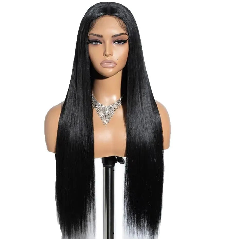 A woman wearing a long, straight, black human hair glueless wig with side bangs
