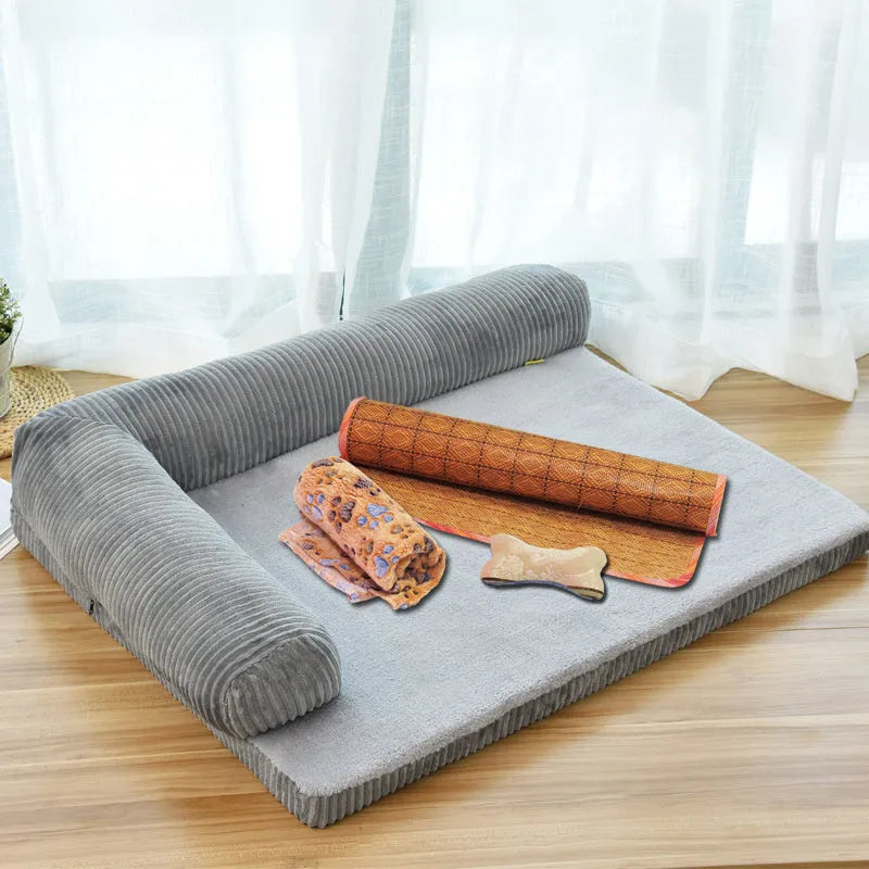 Corduroy bolster dog bed with non-slip base in grey, showing S M L XL size comparison.