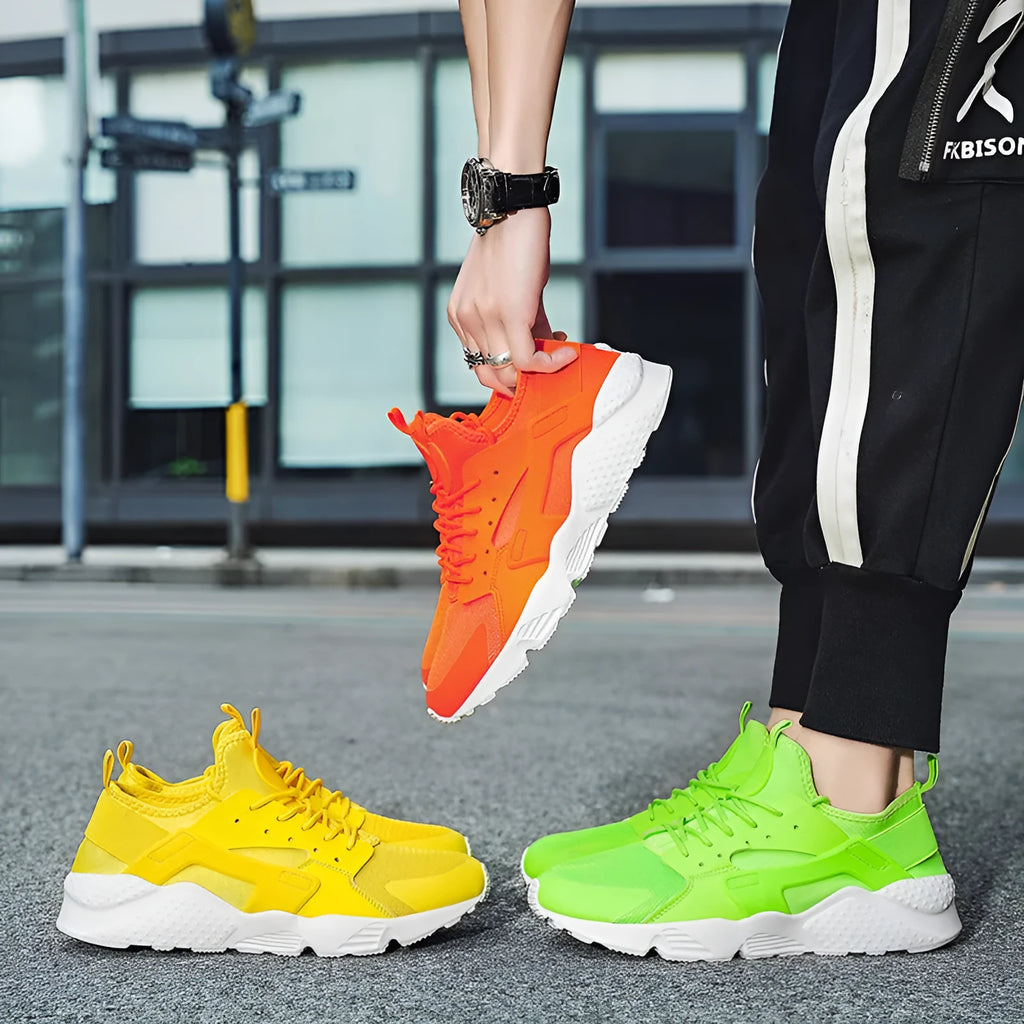 Men's casual low top shoes with mesh upper, cross straps, and flat heel in multiple colours