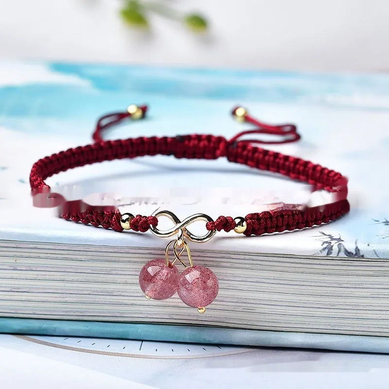 Women's crystal cherry bracelet with adjustable length in natural strawberry quartz colour