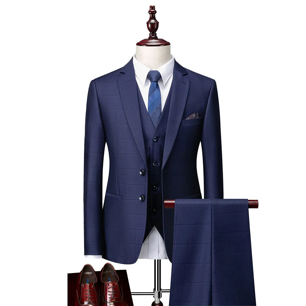 Men's navy blue slim fit three-piece suit with vest, jacket, and trousers for business casual occasions
