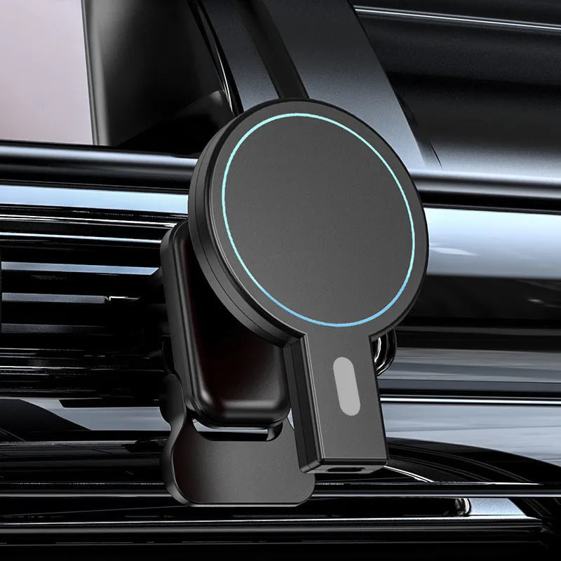Black and white magnetic wireless charger on a desk with phone
