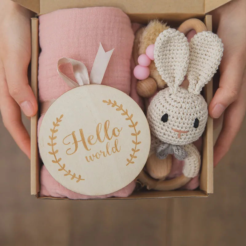 Newborn baby shower toy set of six bath toys in wood and chemical fibre, available in blue, brown, or peach