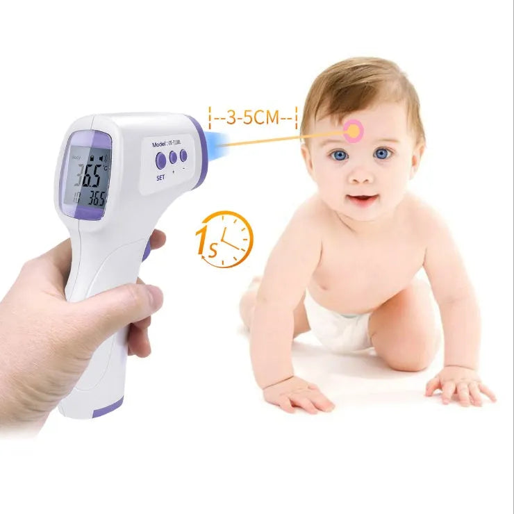 White RAK-FI03 infrared forehead thermometer held near a child's forehead showing non-contact measurement