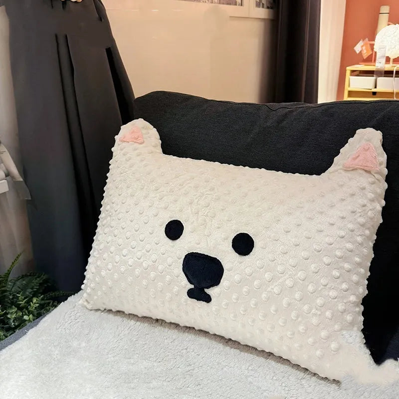 Grey Schnauzer or white West Highland Terrier themed pet pillow cushion on a sofa