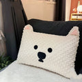 Grey Schnauzer or white West Highland Terrier themed pet pillow cushion on a sofa