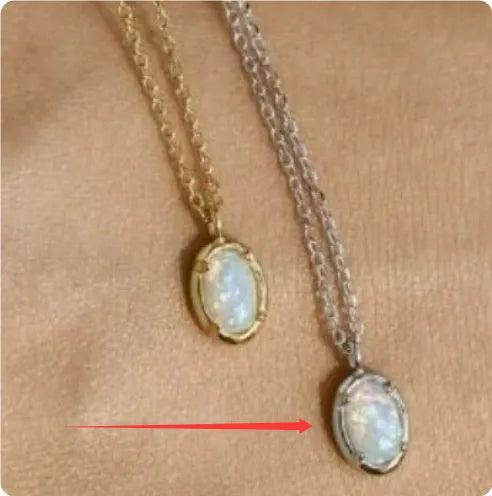 Oval jelly opal pendant necklace on a silver chain with choice of gold or white gold finish.