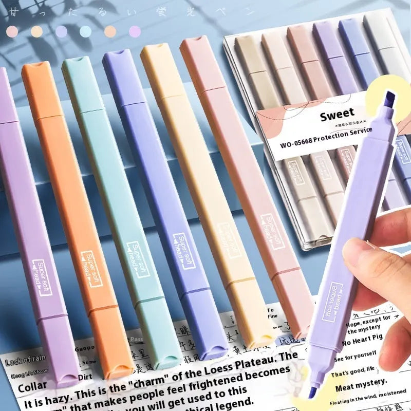 Set of double-headed fluorescent marking pens showing fine and broad tips, in mixed colours.