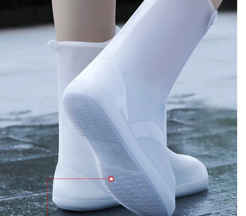 White PVC high top women's water resistant shoe covers with anti-skid soles shown in size options