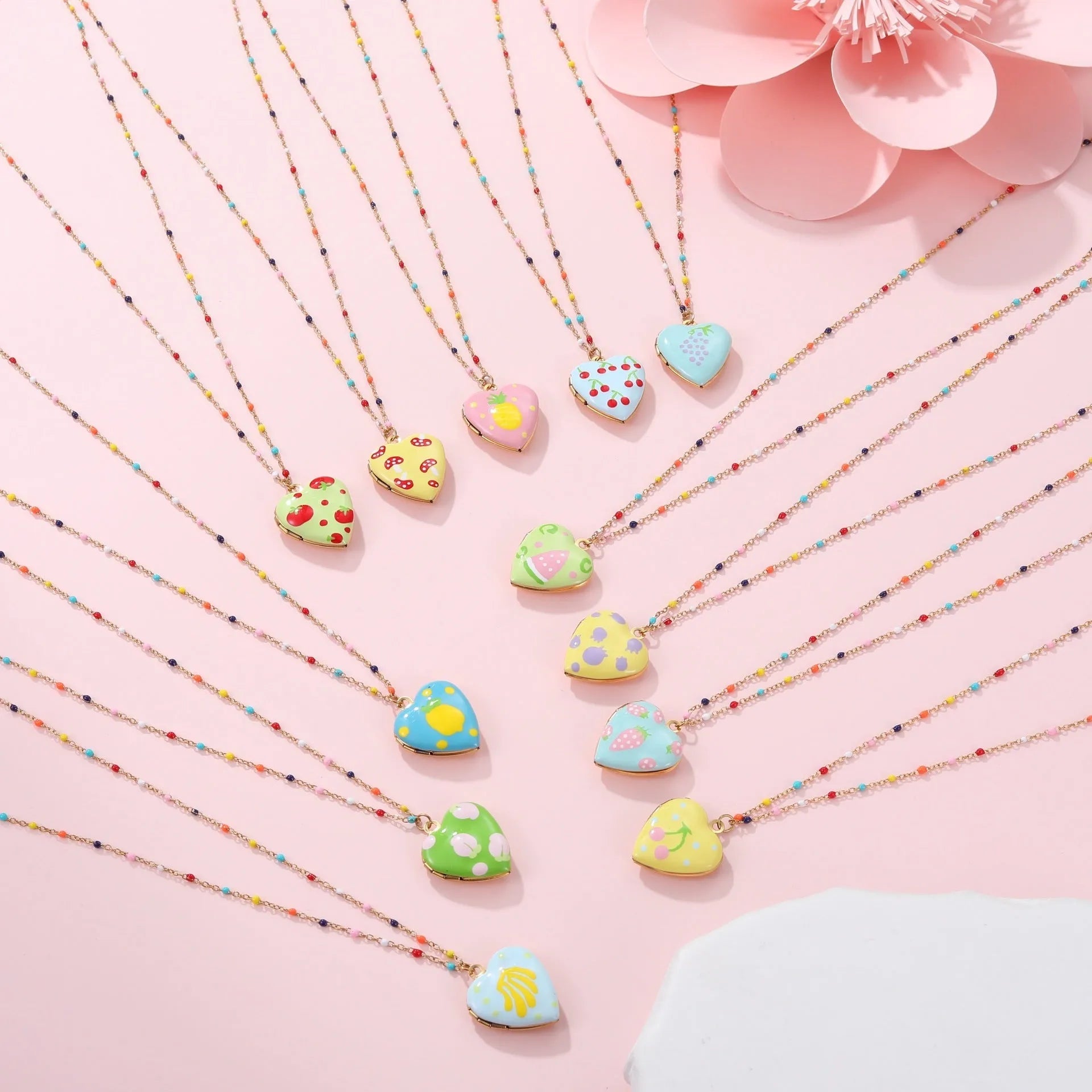 Women's stainless steel necklace with fruit pendant designs in gold plating on adjustable chain