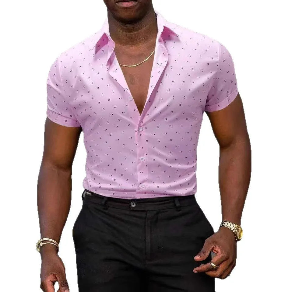 Man wearing light blue short-sleeved shirt with floral pattern, made from stretch polyester fabric