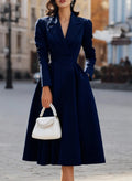 Women's high waist flared long sleeve dress in solid black polyester with waist-tucking design, front view.