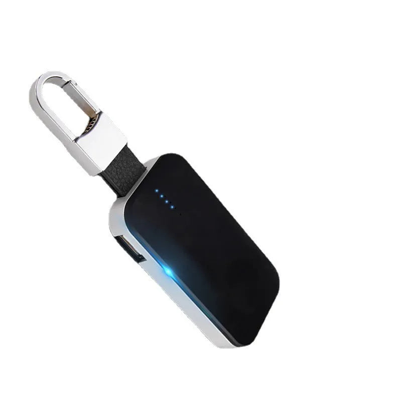 Black keychain-sized portable power bank for wireless Apple Watch charging