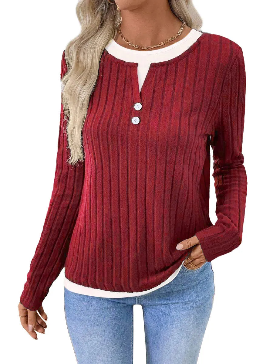 Women's black fake two-piece round neck pullover sweater with long sleeves.