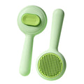 Cat grooming brush with stainless steel teeth and non-slip handle in green and yellow colours