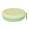 Collapsible silicone dog bowl shown in open and folded positions for portable pet feeding