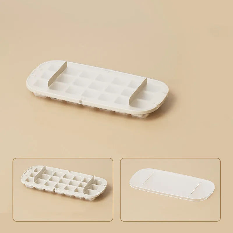 High-capacity plastic ice cube tray with grid pattern and ice shovel, shown in blue colour.