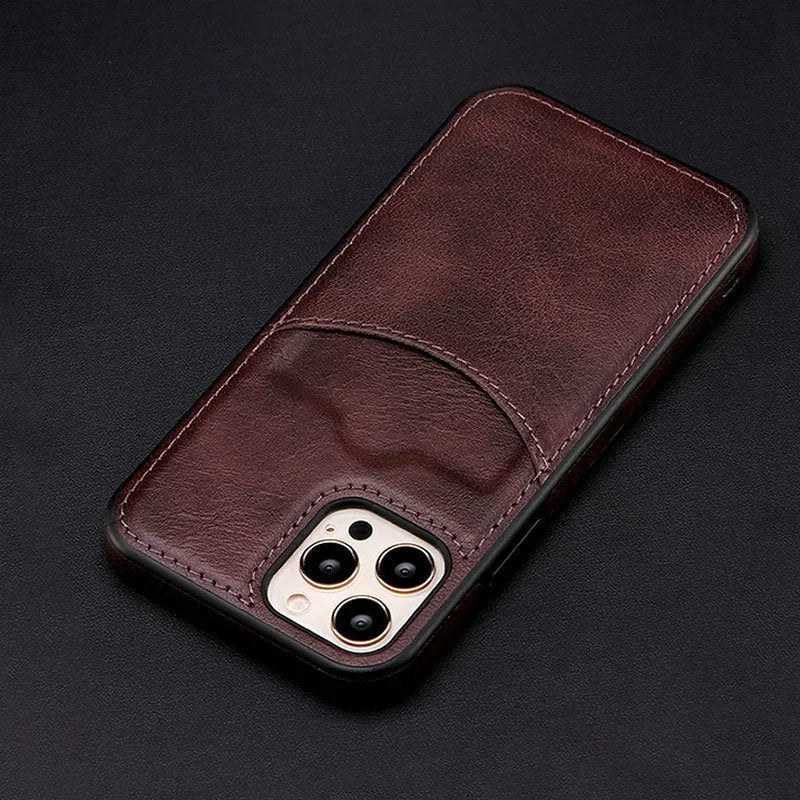 Dark blue PU leather protective case for iPhone on a table.