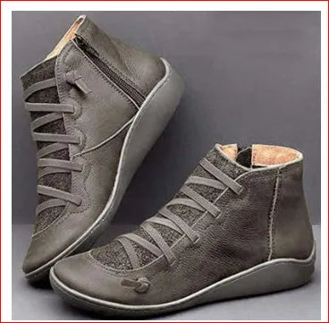 Women's casual ankle booties with synthetic PU upper and flat wedge heel in multiple colours