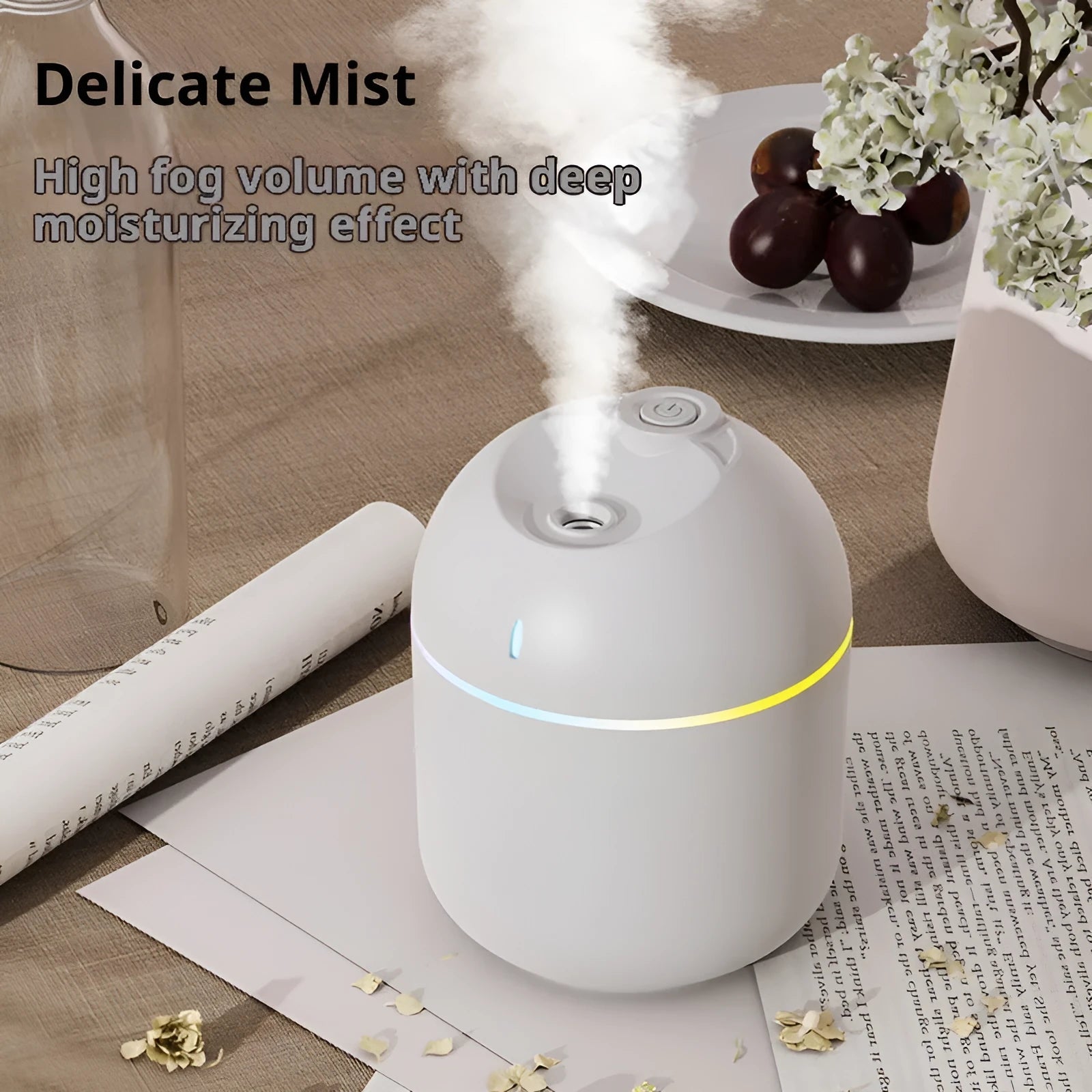 USB desktop humidifier with large spray, mute operation, and colour light in green plastic body