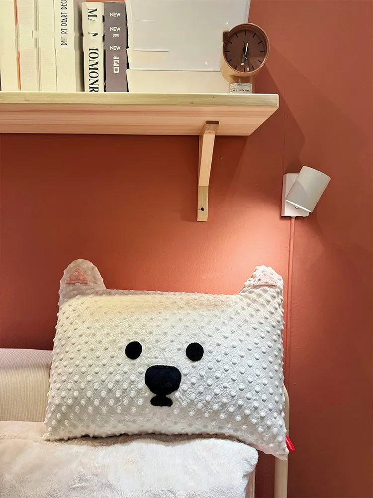 Grey Schnauzer or white West Highland Terrier themed pet pillow cushion on a sofa