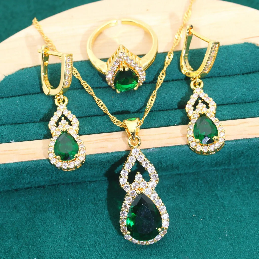 High-end bridal jewelry set with copper inlaid zircon cross and crown pendants in electroplated green and red finish on water wave chain