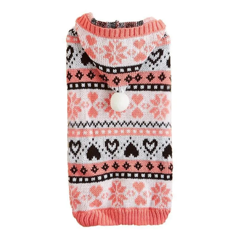 Blue striped camouflage knitted acrylic sweater on a small Bichon dog, showing snowflake and love heart patterns.
