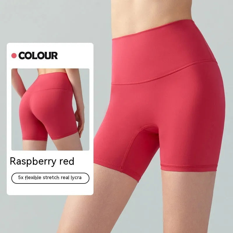 Women's high waist leaf green Lycra yoga shorts for fitness and cycling.