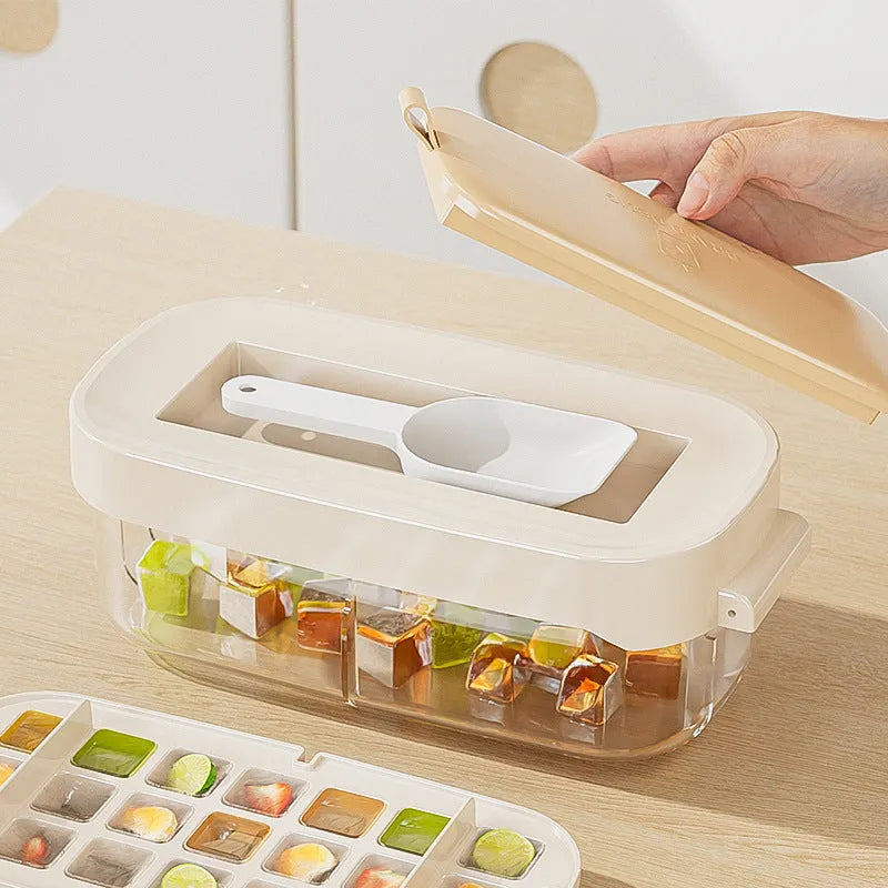High-capacity plastic ice cube tray with grid pattern and ice shovel, shown in blue colour.