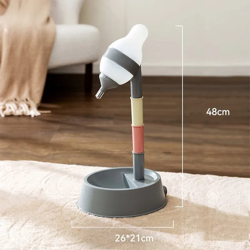 Green adjustable height pet water dispenser with separate bowl and stable base on kitchen floor