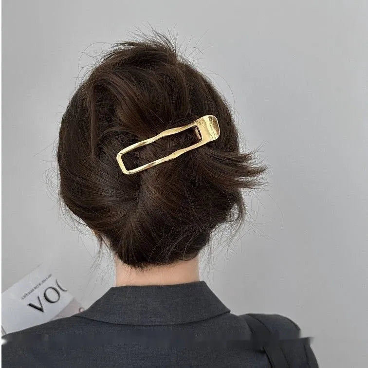 Gold and silver zinc alloy barrettes in square, arc, and triangle shapes for women
