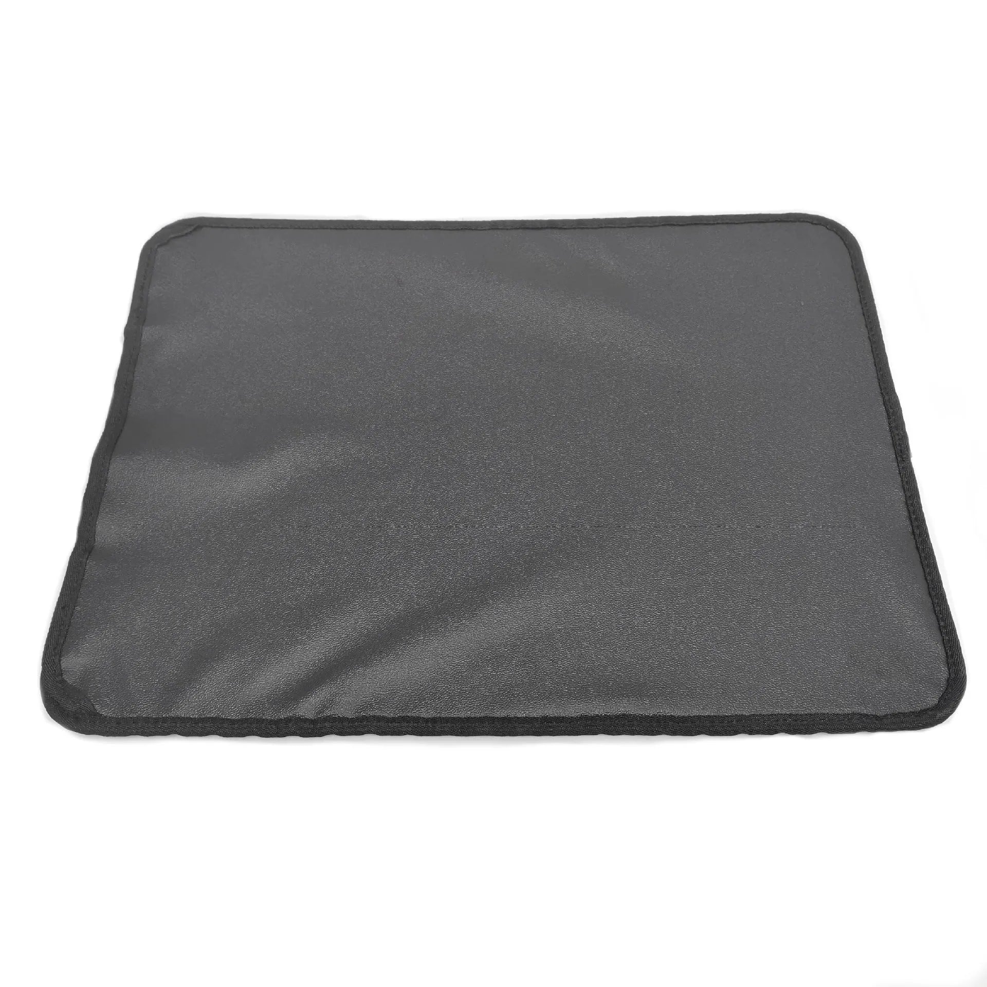 Double-layer EVA cat litter mat in black with honeycomb texture, 1.5cm thick, placed under a litter tray