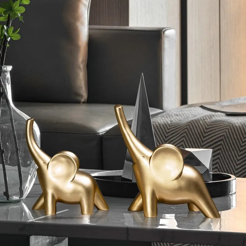 Modern Fortune Bring Elephant resin ornament in rose gold on a plain background