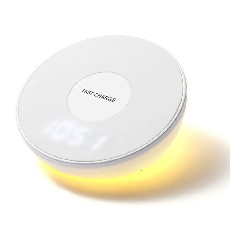 White 10W wireless charging pad with digital clock display and three control buttons.