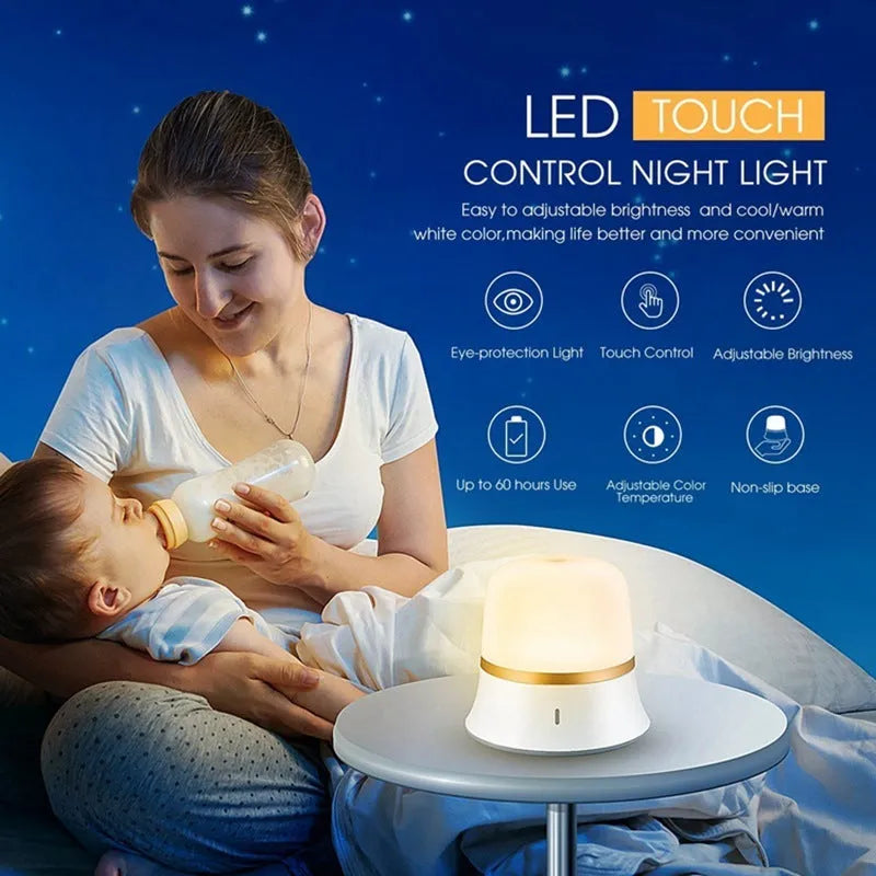 White touch-control bedside night light with motion sensor and rechargeable battery on a table.