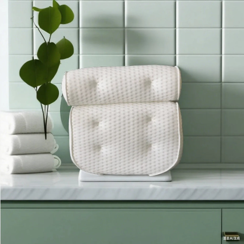 White 4D mesh bathtub pillow with multiple suction cups on a light luxury styled bath mat.