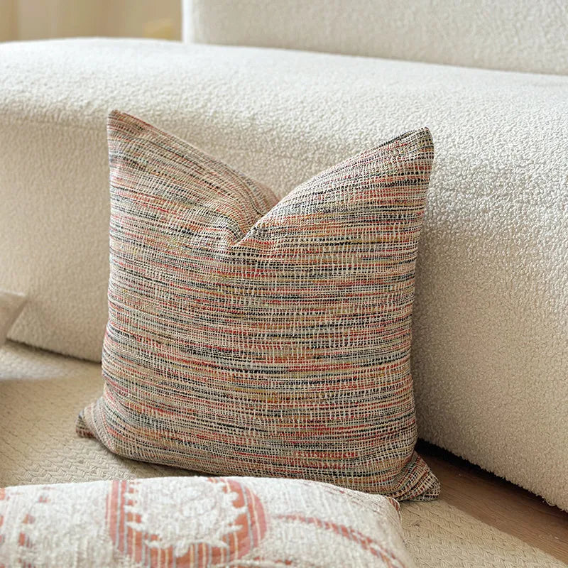 Amber jacquard paisley patterned sofa cushion cover with botanical floral design.