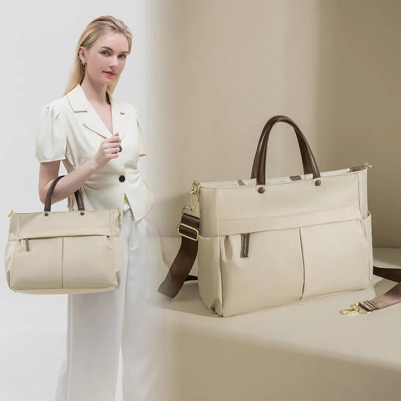 Women's Oxford cloth laptop bag with open pockets showing elegant black and nuts apricots colour options