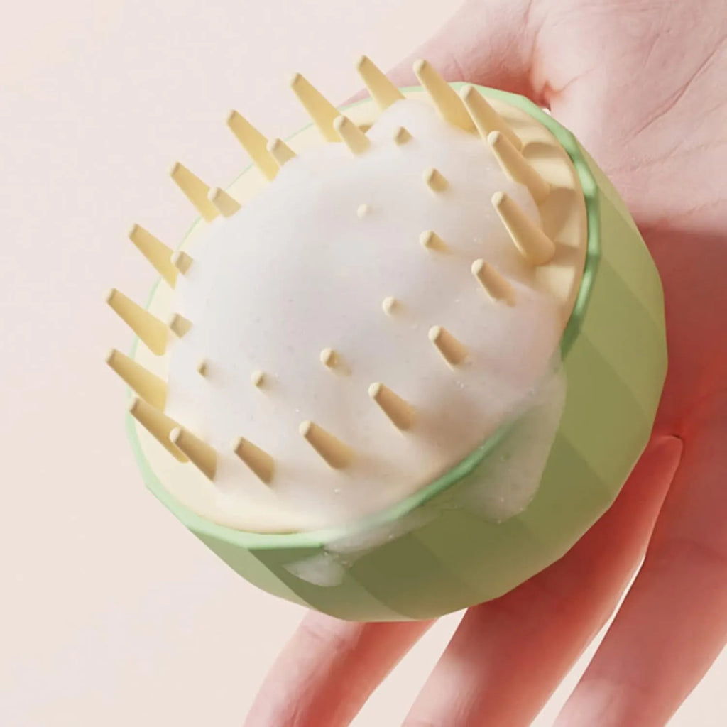 Green pet bath brush with drainage holes and rounded massage bristles for dogs and cats