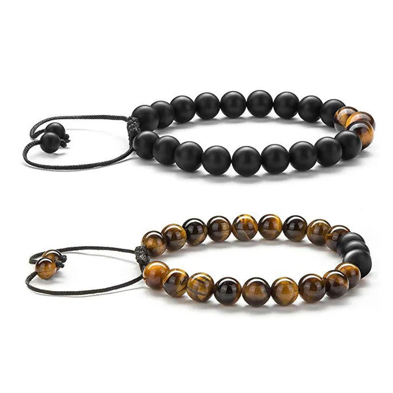Geometric matte black agate couple bracelets with tiger eye beads, shown as a matching set.