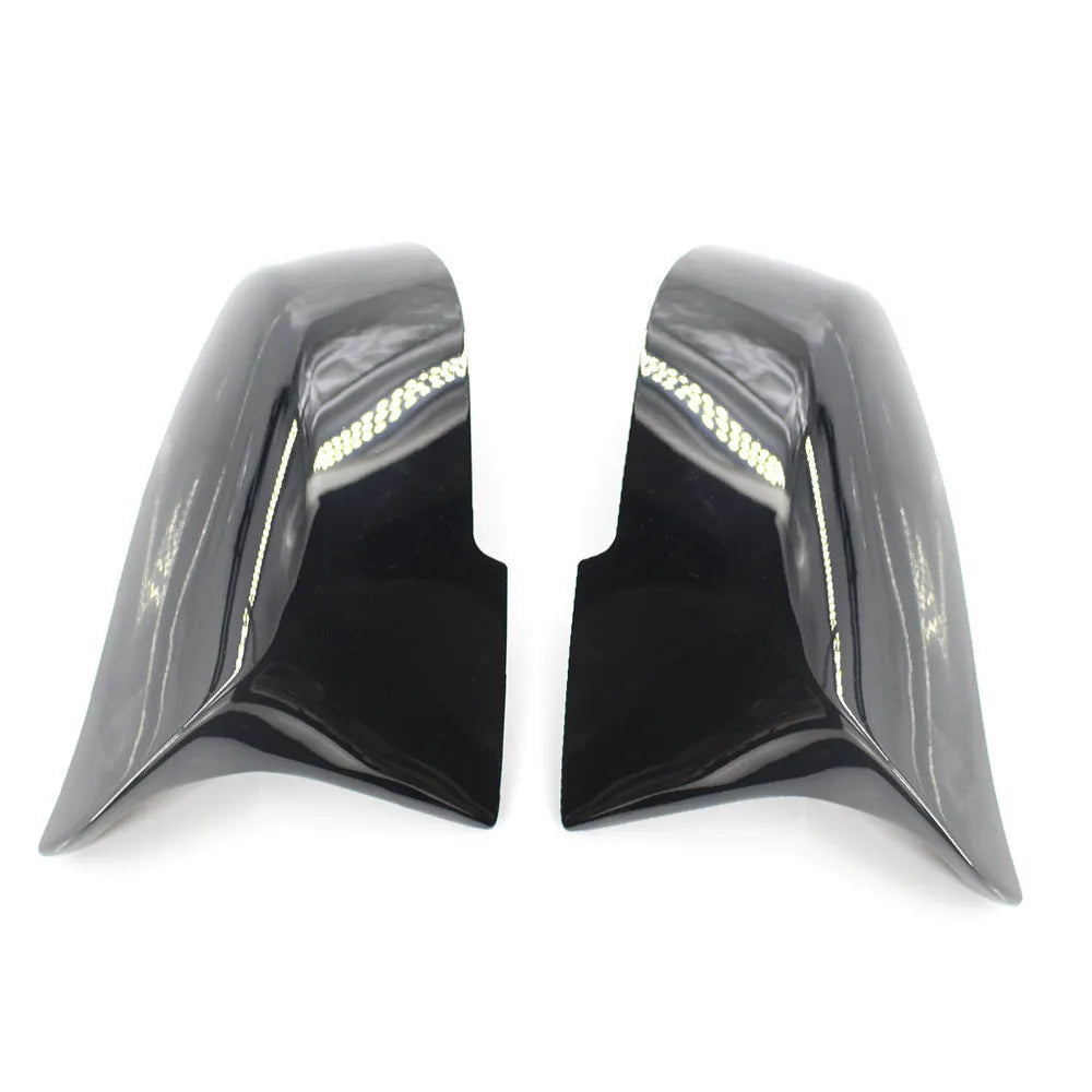 Pair of paint bright black BMW rear-view mirror replacement shells for 3 Series and 4 Series models.