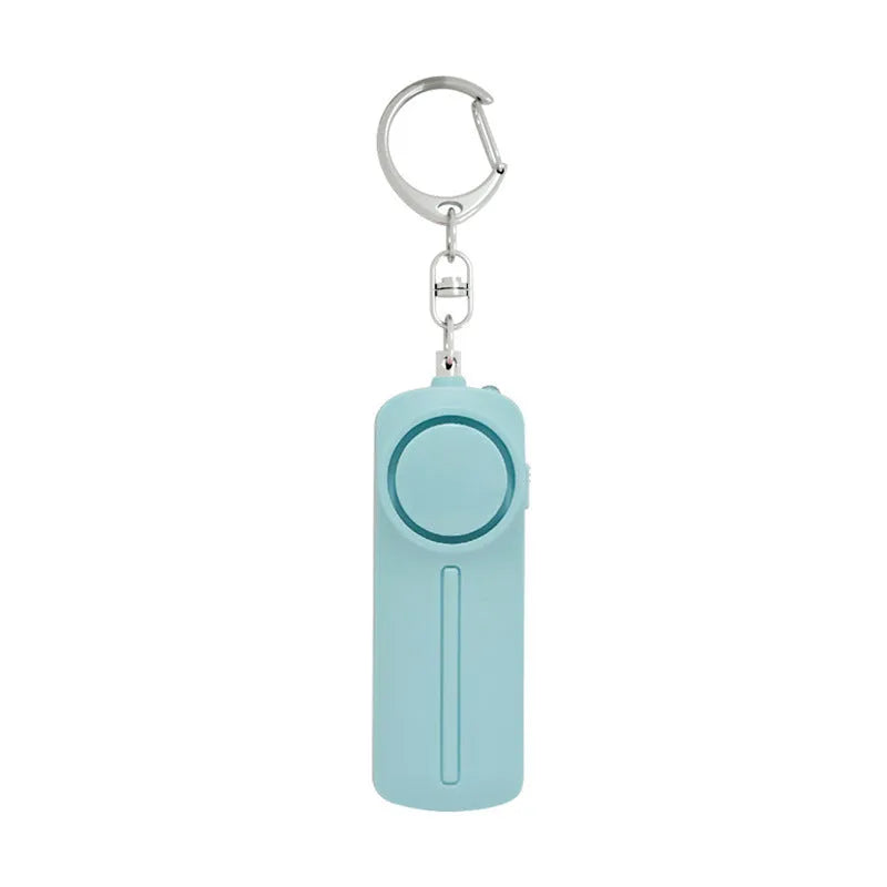 Girls personal safety alarm in multiple colours showing compact 86mm design with activation button