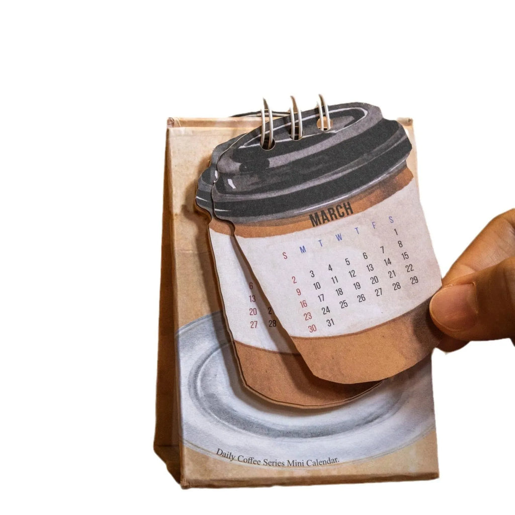 Coffee themed mini desk calendar 2025 with ten different daily designs including Coffee Time and Life Is Not Easy