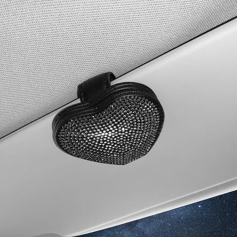 Diamond-encrusted PU leather car sun visor clip with magnetic closure for storing glasses and tickets.