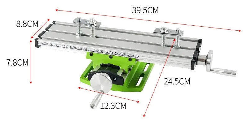 Mini bench drill milling machine with AC power supply and included bench pliers on workbench