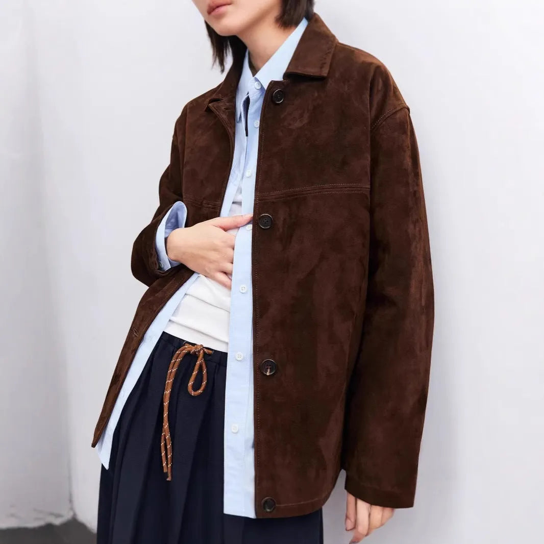 Women's retro-style cashmere coat with Peter Pan collar in yellow brown colour showing leather stitching details