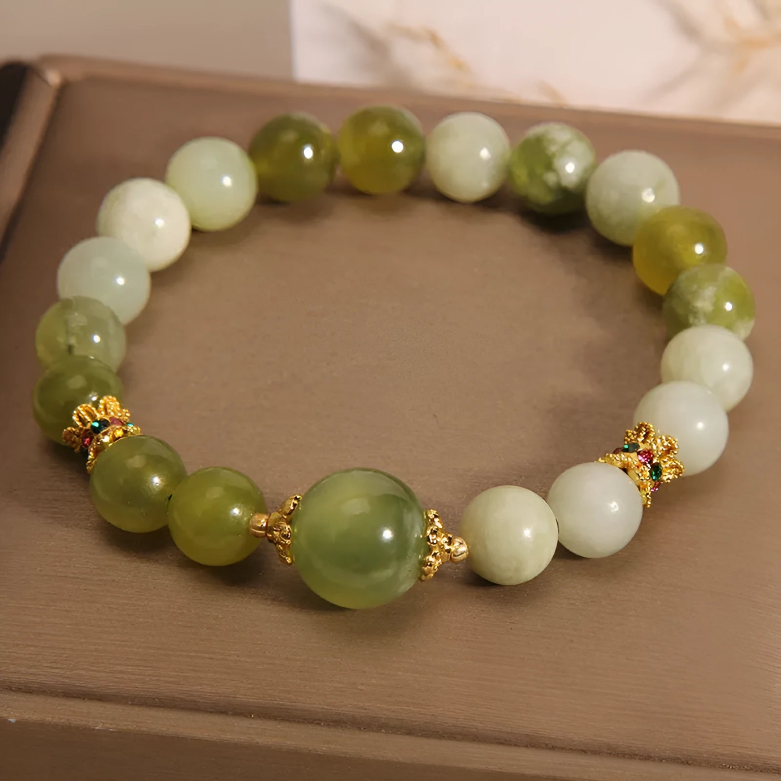 Women's bracelet made of green Xiuyan jade with an original design
