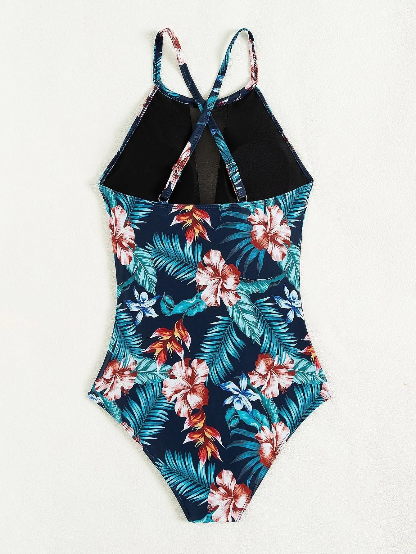 Women's deep V-neck one-piece swimsuit in a solid colour, gradient, or print pattern.